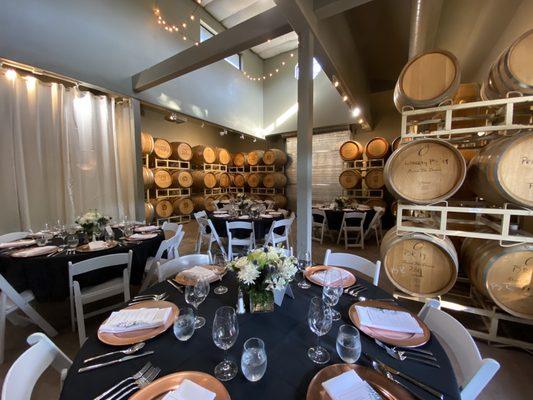 Winemaker's dinner shot of the interior of the barrel room.