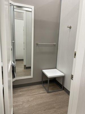 Here's a peek inside one of the fitting rooms. Spacious with lots of mirrors and well lit.