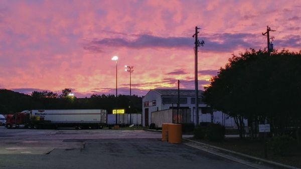 Sunset looking away from the building towards the truck lot