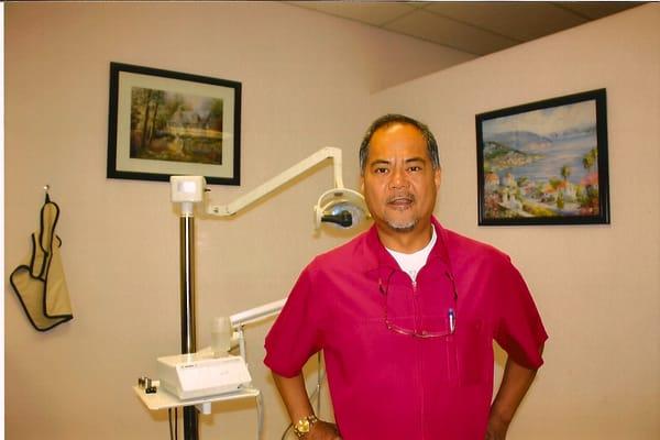 Dr. Hector Z. Landig ready to improve your oral health.