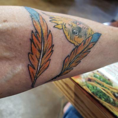 He redid a tattoo from years ago, and did a portrait of a cockatiel I lost....he did an awesome job!