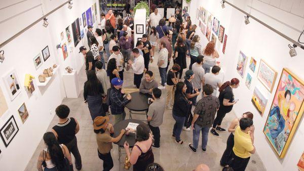 Opening reception of The Local Group Show 5, a group art exhibition highlighting local artists.