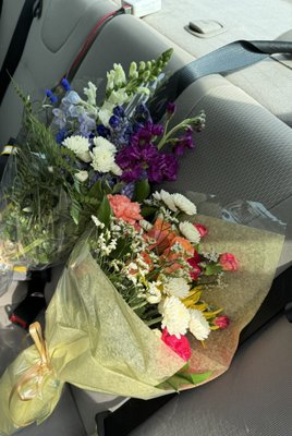 Here are the 2 bouquets I made. I chose the flowers and the lady helping me added greenery and packaged them up so nicely!