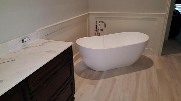 Free-standing tub and faucet.