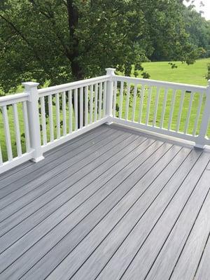 WOLF decking floor w white vinyl rail