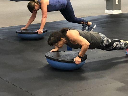 Look at Kelly go!!! Push ups on the Bosu Ball.