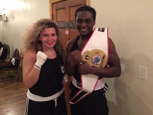 Ashley K and Klaw pose after their bouts.