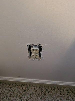 Missing outlet cover.  Considered "cosmetic"