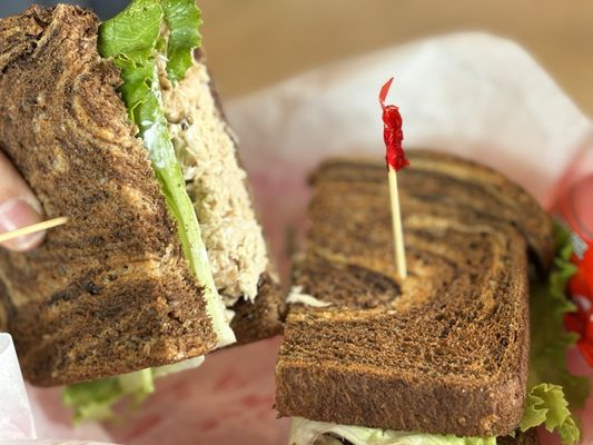 Camano Sandwich on Rye ( Tuna, lettuce, + Mayo ) came with a bag of chips.