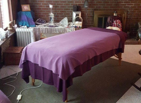 The massage table is extra wide, padded and heated (if needed) for your comfort.