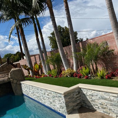 Adding some beautiful greenery to a pool