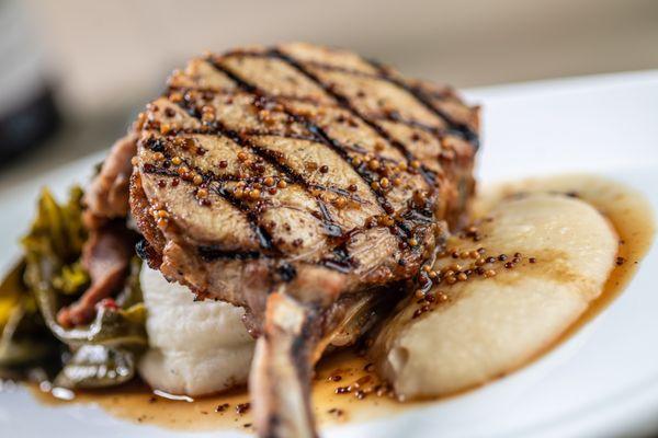 Rack of Pork: Roasted & Grilled, Bacon Greens, Grilled Garnet Yams, Apple Butter, Mustard Seed Maple Sauce