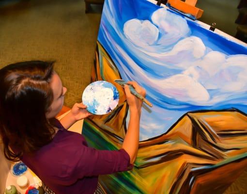 Art in Worship: Lisle Gwynn Garrity painting during sermon on Ezekiel and The Dry Bones