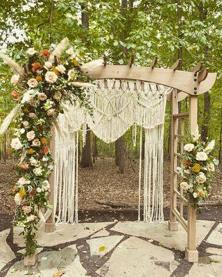 Boho wedding with neutral blooms and pampas grass.