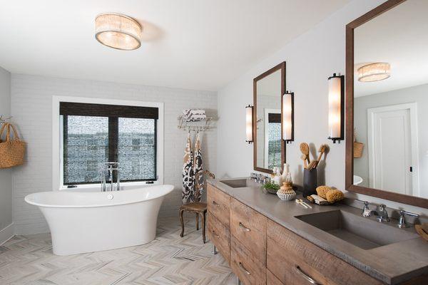 Concrete vanity with integral sinks.