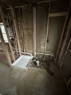 Garage converted into living quarters. Shower, toilet and vanity sink