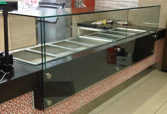 Tempered glass sneeze guard for food court restaurant