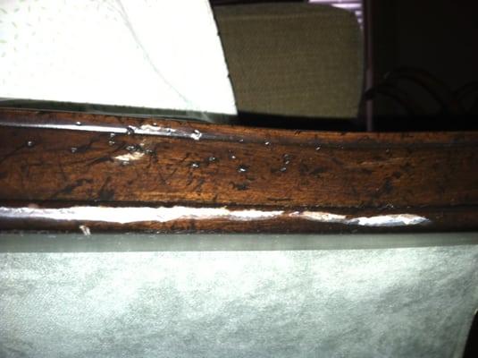 Wood removed from brand new Bernhardt sofa frame - damaged in local move by Triangle Moving Service.