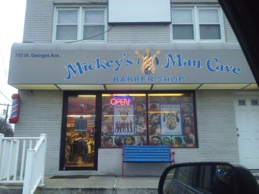 The outside of the barbershop. This barbershop is in Woodbridge, NJ.