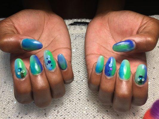 NOT POLISH!  This is actually Sky blue, Neon green, Royal blue and Turquoise Acrylic powder, all laid perfectly in a verticle ombre pattern.