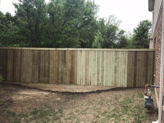 Pressure treated pine pickets  Side by side