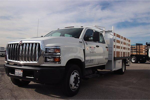 Stake bed truck with liftgate