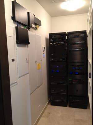 Equipment closet with Control4 home automation system