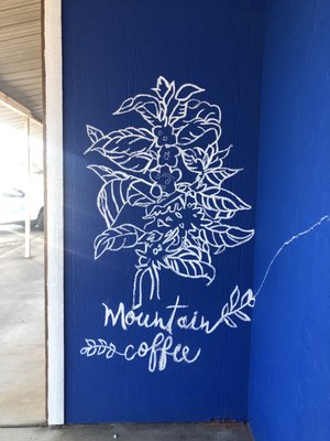 New Wall mural with the shop logo