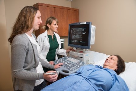 Patient meets with Dr. Zalasin and radiology technologist.