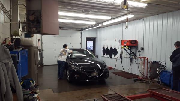 Detailer making this vehicle look brand new!