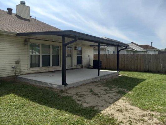 Concrete & bronze/ivory patio installation.