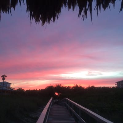 Sunset yoga on the beach in the town of Palm beach shores