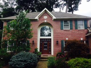 LEGACY Window & Door is replacing painted steel doors with factory stain pre-finish like this one in Carmel