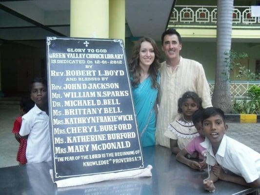 Dr. Bell and his daughter volunteering at an orphanage in Salem, India.