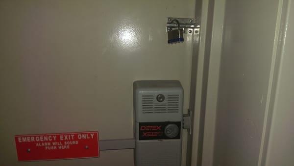 Padlocked emergency exits.  #trappedlikerats