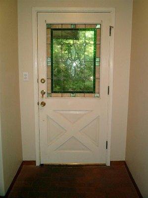 Before: 1953 single pane leaky sieve door. Either a blast of cool are hot when you walked near. Out!