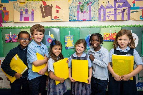 Kindergarten students ready for their writing group.