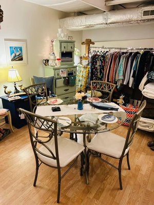 Glass top metal table with chairs