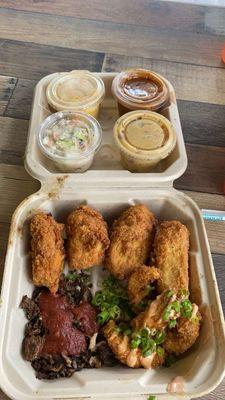 spicy fried chicken,BBQ fried shrimp, smoked brisket, smackaroni, creamy Cajun potato salad, candied yams, Tasha's coleslaw