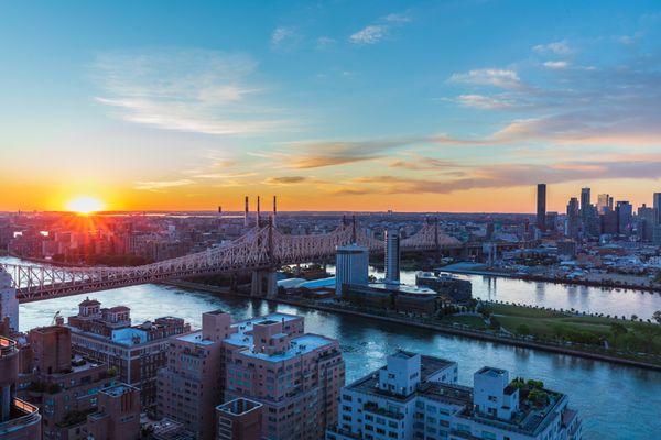 Rooftop view of sunset and Queensboro Bridge