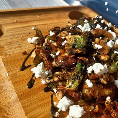 Flash Fried Brussels Sprouts, Golden Raisins, Toasted Walnuts, Bacon, Goat Cheese, and Reduced Balsamic