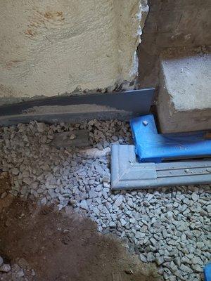 Water drainage system under the bulkhead