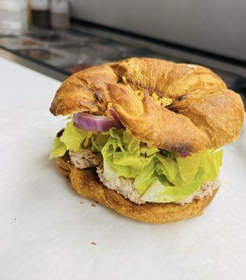 Homemade Classic Tuna on a Croissant with lettuce, onions, & tomatoes