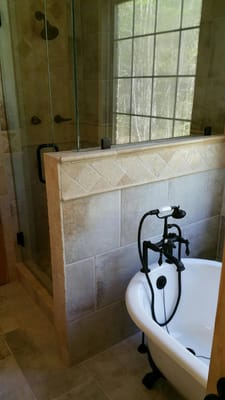 Claw Foot Tub with oil rubbed bronze fixtures