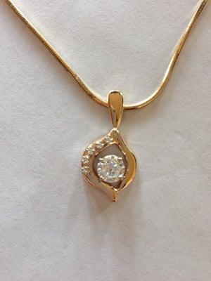 Used customers gold and grandmothers diamonds to create this 1 of a kind 14 k pendant for a customer