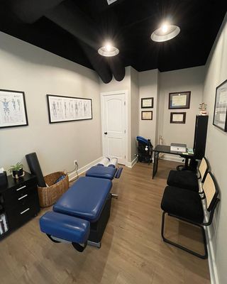 Dr. Long's treatment room with his trusty flexion/distraction table (also called leander table) complete with drops table capabilities.