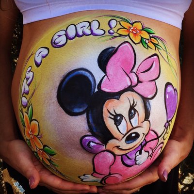 Minnie Mouse Belly Bump design by Snappy Face Painting located in Denver CO