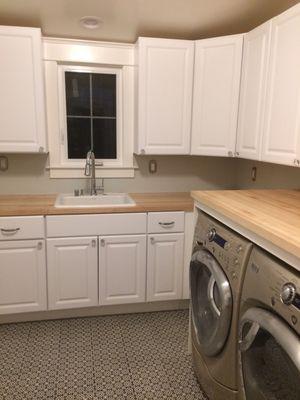 Laundry room fixture was super affordable and still looks in synch with the rest of the house