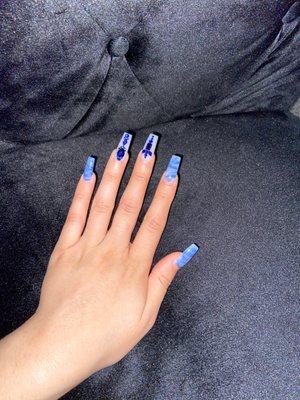 marble nails with blue diamonds