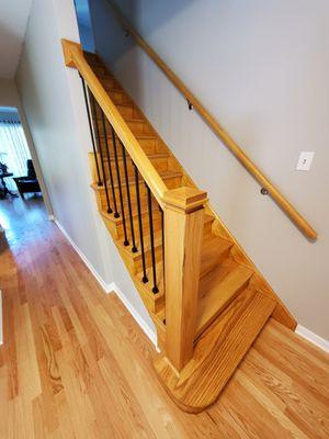 Stair and railing with custom newel post